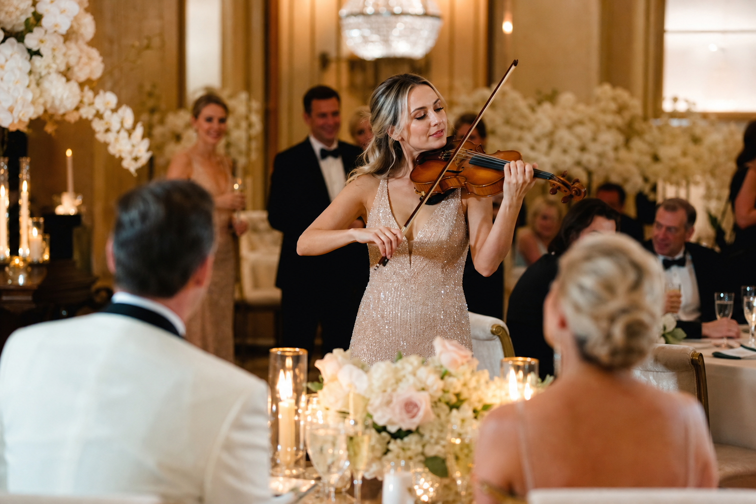 Bright glamorous Palm Beach vow renewal with live violin, elegant couple dancing, lush South Florida garden, and golden evening light