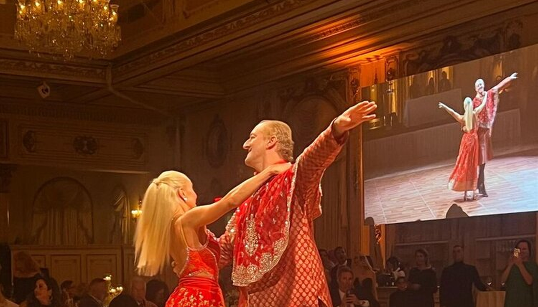 Elegant Palm Beach charity dinner with formal guests, candlelit tables, and a luxury South Florida ballroom atmosphere