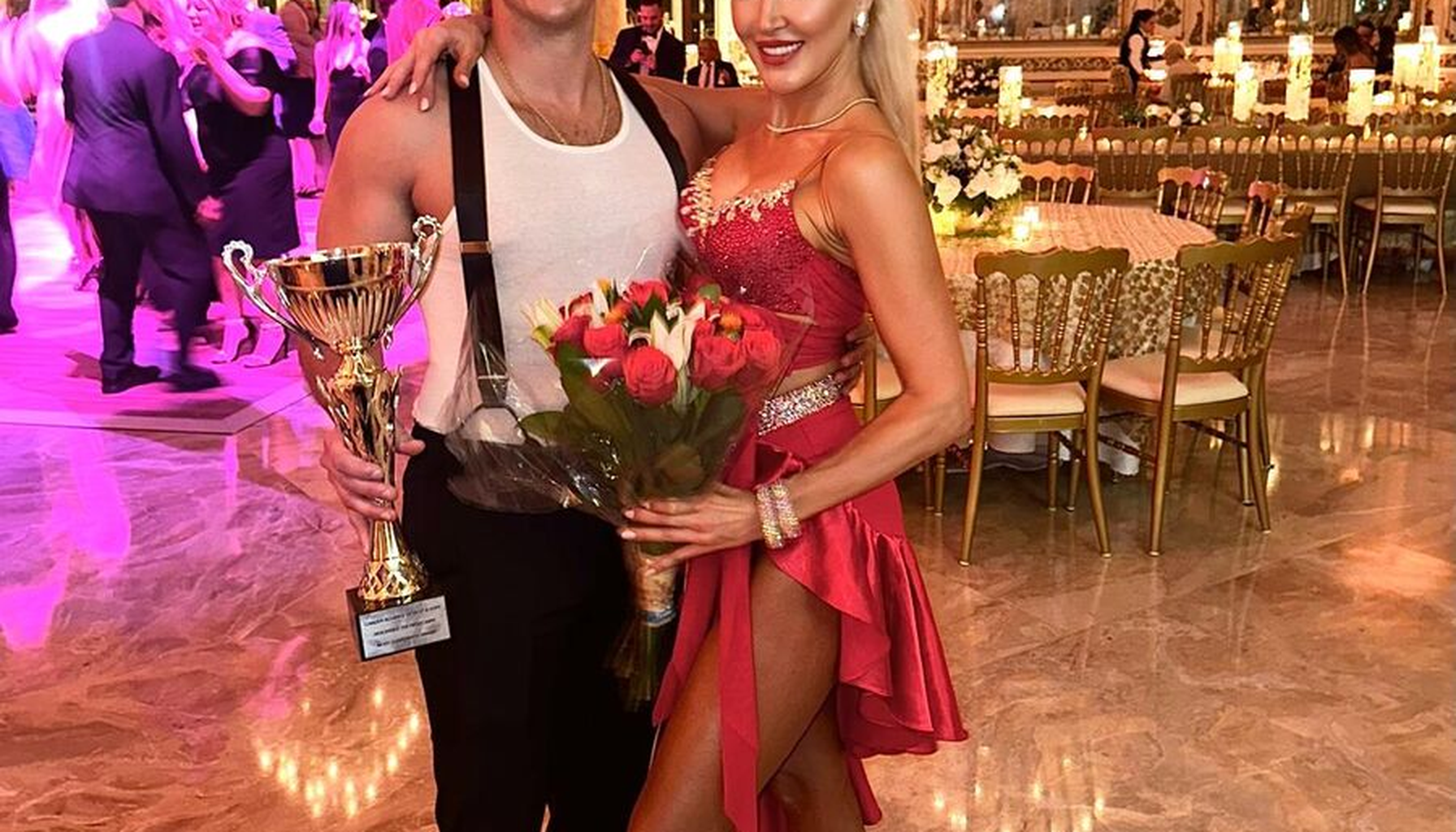 Elegant Palm Beach estate dinner party with live violin, candlelit tables, stylish guests, and graceful dancing in a luxury South Florida setting