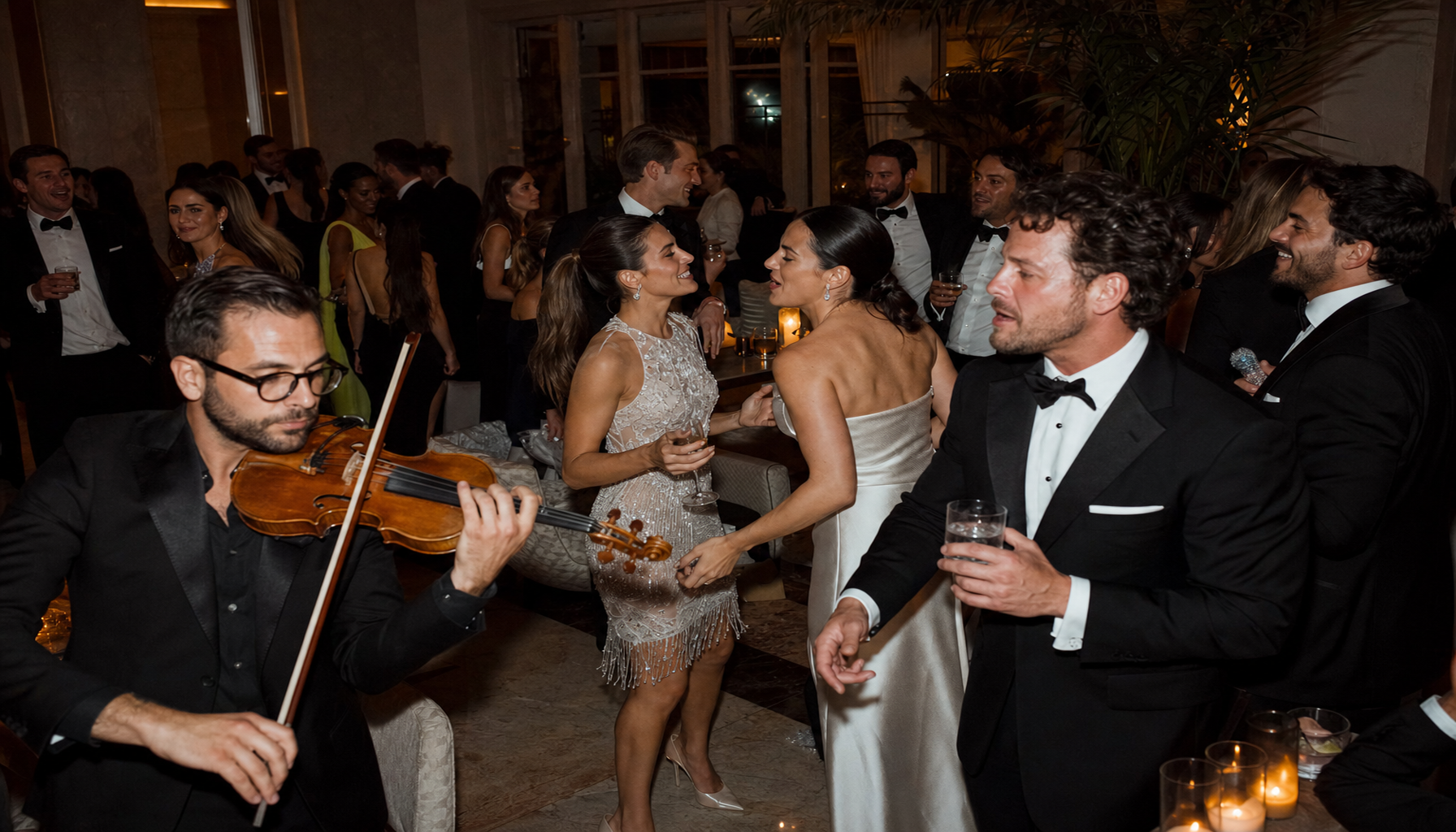 Bright glamorous Palm Beach wedding after-party with live violin, elegant late-night dancing, stylish guests, and warm South Florida lighting