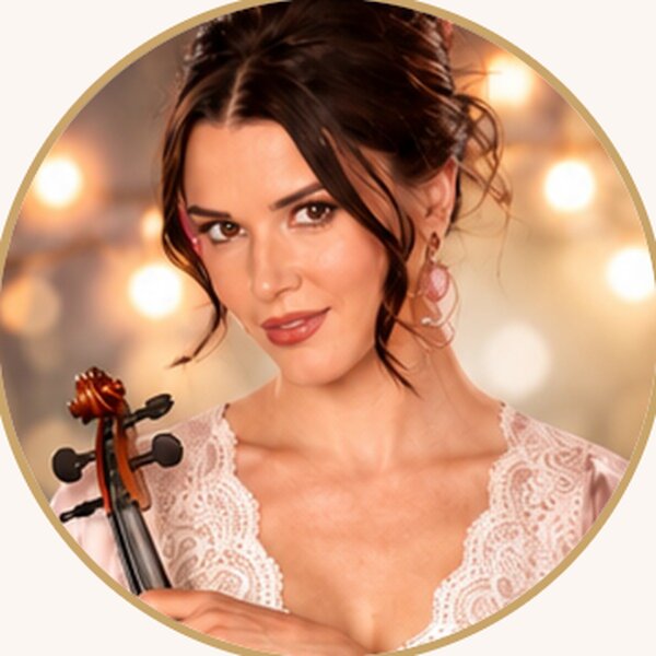 Anna Cordin holding her violin