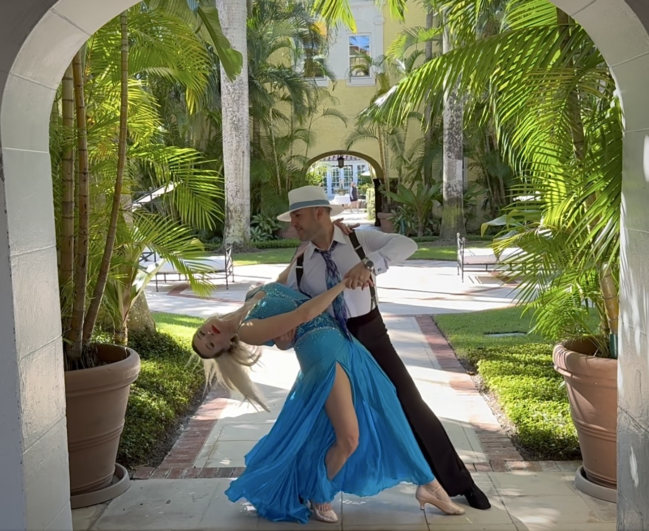 Graceful ballroom dancers showcasing elegant choreography at Palm Beach event