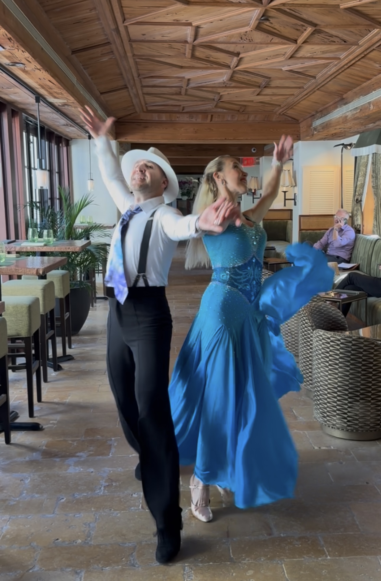 Couple performing elegant ballroom dance at South Florida wedding celebration